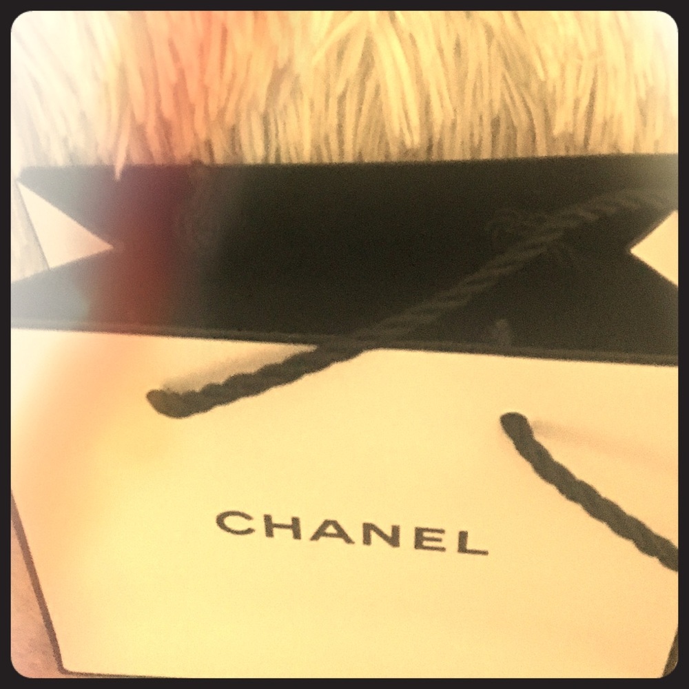 Small Chanel jewelry or fragrance bag.